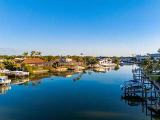 Obraz premium Naples Florida aerial photo luxury waterfront homes with boat dock
