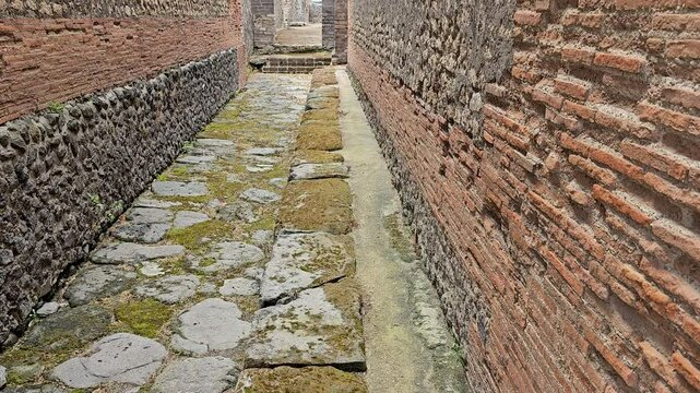 Pompeii, Italy-Parallel ruin walls-Tilt-Zoom