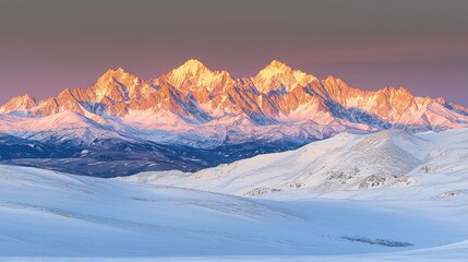 Majestic snow-covered mountain range at sunrise, casting golden hues over the serene landscape