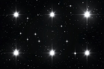 Fototapeta premium black and white photo of a starry sky with a large number of stars. The stars are all different sizes and are scattered throughout the sky. The photo gives off a sense of wonder
