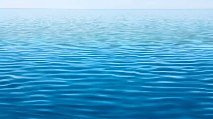 Calm Blue Ocean Water Surface Under a Clear Sky