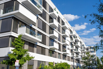 Gray-white multi-family residential building, seen in Berlin, Germany