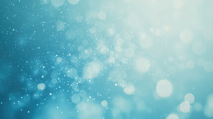 Obraz premium A dreamy festive background featuring a starry sky with blue light bokeh, creating a magical atmosphere for the holiday season. The soft glow and twinkling stars evoke feelings of celebration and joy