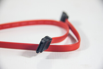 Sata Computer data Cable, telecommunication technology transfer, network solutions, digital hardware global equipment, red unit, selective focus, shallow depth of field, Cairo Egypt