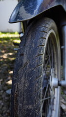 Close-up of a Motorcycle Tire with Brand and Model Engraving