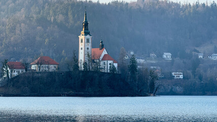 Scenic Bled Lake with island church, serene landscape travel destination, Slovenia cultural...