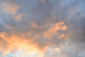The combination of orange and gray makes the sunset sky very beautiful