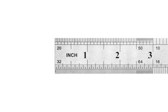 Close up of metal steel ruler is isolated on white background.