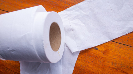 White Tissue Roll on Wooden Table – Minimalist Everyday Object