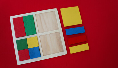 Wooden educational toy for kids. Montessori system for early childhood development. Vivid elements that will help develop fine motor skills of hands and analytical thinking. square shape