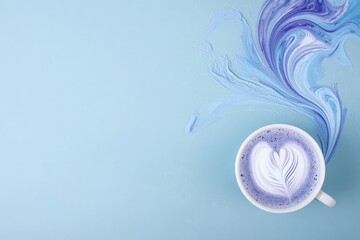 A beautiful latte art cup on a blue background, featuring a heart design with swirling purple patterns.