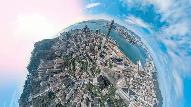 A 4k still video frame shows a Hong Kong aerial view, zoomed in, creating a little planet effect.