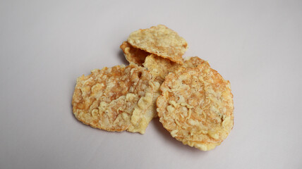 Keripik Tempe or Tempe chips, a typical Indonesian food made from thinly sliced ​​tempeh and then fried using seasoned flour. It's salty and savory. Close up