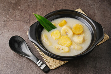 Kolak Pisang Ubi, made from banana, sweet potato, coconut milk, sugar and pandanus leaves. Indonesian traditional food 

