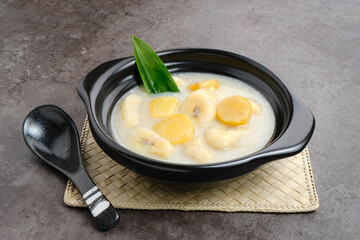 Kolak Pisang Ubi, made from banana, sweet potato, coconut milk, sugar and pandanus leaves. Indonesian traditional food 

