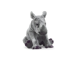 Fototapeta premium miniature baby rhinoceros toy with white background