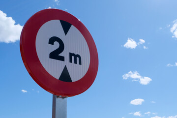 Street Sign 2m Meter Height Warning with Blue Sky Background Restriction