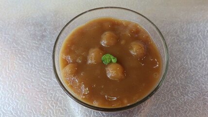 Bubur candil or sweet glutinous rice balls in a sweet coconut sauce,one of favorites traditional dessert in Java