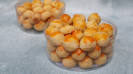 Nastar Cookies, Pineapple tarts or nanas tart are small, bite-size pastries filled or topped with pineapple jam, commonly found when Hari Raya or Eid Al Fitr or Lebaran. Selective focus