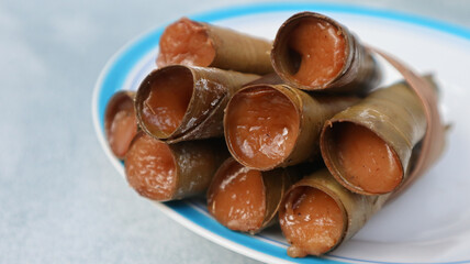 Clorot or Jelurut are traditional snack made from rice flour with coconut milk and palm sugar, wrapped in coconut leaves in a cone shape. Which commonly found in Indonesia, Malaysia and Brunei.