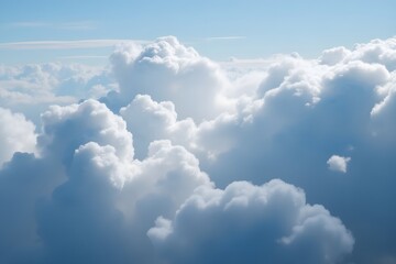 Fototapeta premium Billowy white clouds against clear blue sky