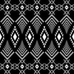 The geometric ethnic pattern of traditional style. Navajo, America Indian patterns. Design for background, wallpaper, clothing, wrapping, Batik, fabric, and prints. Vector illustration.