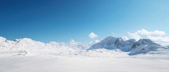 Panoramic View of Snowy Mountains Under a Clear Blue Sky