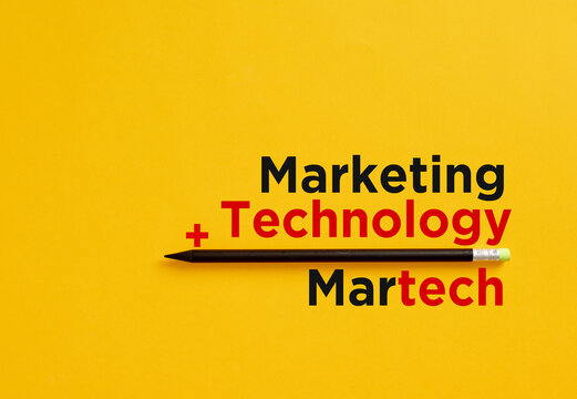 Marketing plus technology equals martech on yellow background