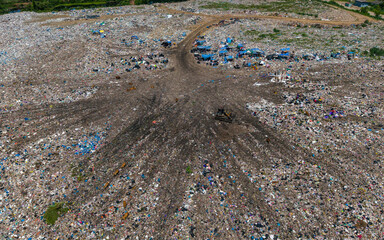 Landfill site, aerial view. Waste management, garbage disposal, environmental concerns.