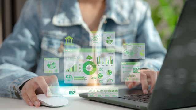 Businessmen use laptops to analyze ESG Co2 Carbon footprint Emission report graph to net zero. Green business corporate responsibility sustainable environment development goal. World Environment Day.