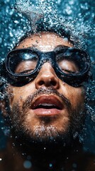Fototapeta premium Diver with goggles emerging from water in clear motion against white background for stock imagery