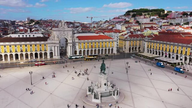 Terreiro do Paco And Arco da Rua Augusta - Praca do Comercio With Equestrian Statue of King Jose I In Lisbon, Portugal. - aerial pullback shot