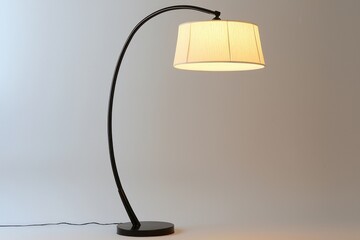 A stylish arc floor lamp with a fabric shade providing ambient lighting in a modern interior, ideal for enhancing home decor and creating a warm, inviting atmosphere.