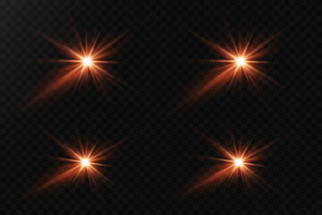 Fototapeta premium Set of glowing flares and lens. Light flash of a star and explosion of light.
