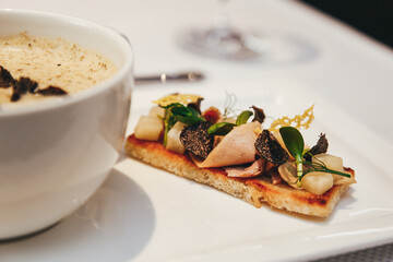 Meat bruschetta with truffle is the perfect complement to onion soup
