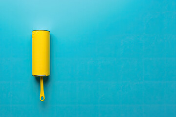 Yellow tin can on bright blue background