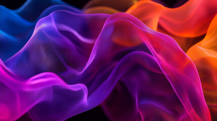 Obraz premium Colorful silk waves dance gracefully against a dark backdrop, showcasing an exquisite blend of hues and movement