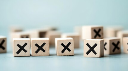 Symbols of mistakes and failures represented by wooden blocks.