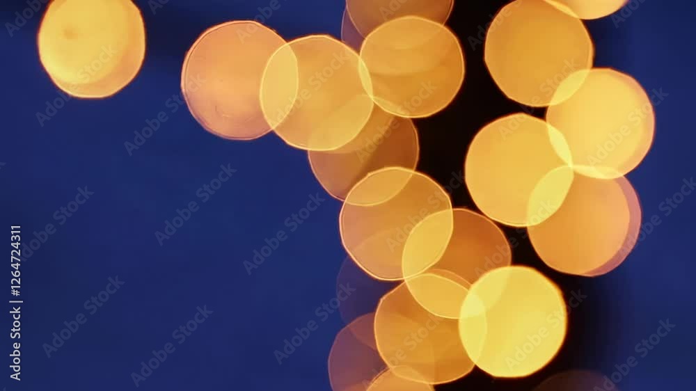 Poster soft golden bokeh lights glimmering against deep blue twilight, creating enchanting visual texture w