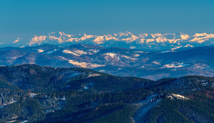 High Tatras and Bystra mountain peak in Western Tatras mountains from Lysa hora hill in early...
