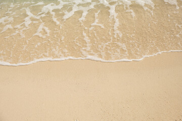 nature of the beach and sea Summer with sunshine, sandy beaches, clear blue waters sparkling against the blue sky. On an island with good ecology and environment Background for summer vacation