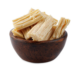 Fuzhu soy sticks in clay plate isolated on white background.