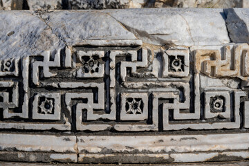 The ruins of Didyma are located a short distance to the northwest of modern Didim in Aydın Province, Turkey. It sits on a headland that in antiquity formed the Milesian Peninsula. Didyma was the large