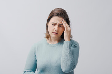 Woman suffering from severe headache