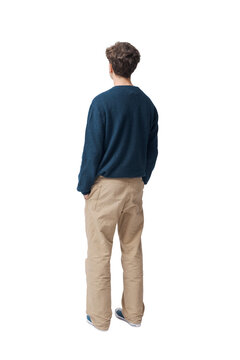 Teenager standing and looking away back view