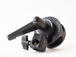 Black metal gear mechanism with a handle and a knob.