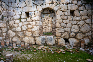 Remains of gymnasium in acnient Lycian city Arycanda. Ancient city on mountain near Aykiricay village.Well preserved semi-circular theater of Arycanda, ancient Lycian city in Antalya