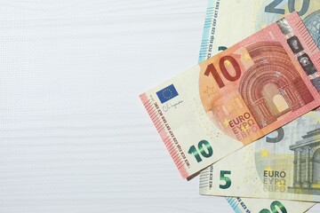 Euro banknotes on the table. Finance and economics. Saving money concept. Saving currency. Investments. Copy space