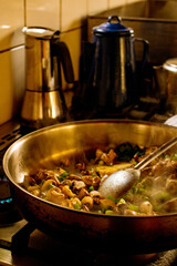 Buttery vegetables over gas stove