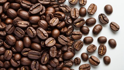 Fototapeta premium Close-up of roasted coffee beans on white background with scattered beans and Copy Space for text placement